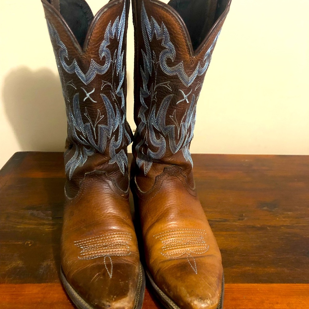 Twisted X brown cowboy boots with blue stitching. Size 6.5. Used condition.